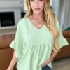 Airflow Peplum Ruffle Sleeve Top in Sage - Fashion Are Us